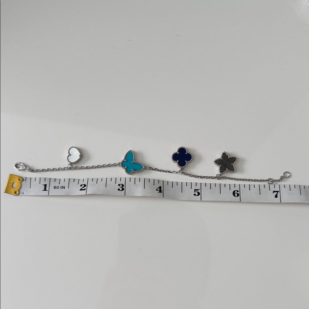 Elegant Silver and Blue Charm Bracelet